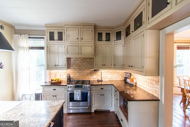 1651 Mergendollar Rd, Good Hope, GA 30641 - kitchen with tasteful backsplash, stainless steel range with gas stovetop, dark wood finished floors, and dark stone countertops