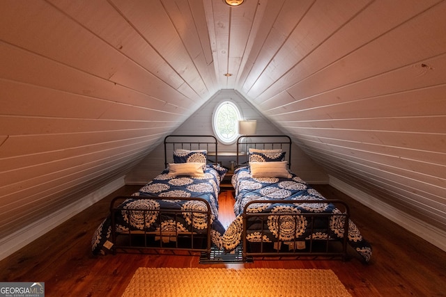 1651 Mergendollar Rd, Good Hope, GA 30641 - bedroom featuring wooden ceiling, wooden walls, vaulted ceiling, and hardwood / wood-style flooring