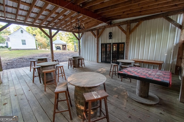 1651 Mergendollar Rd, Good Hope, GA 30641 - deck with outdoor dining area, french doors, and outdoor dry bar