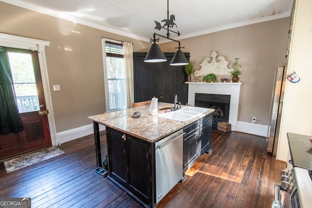1651 Mergendollar Rd, Good Hope, GA 30641 - kitchen with ornamental molding, a fireplace, dark wood-type flooring, appliances with stainless steel finishes, and a sink