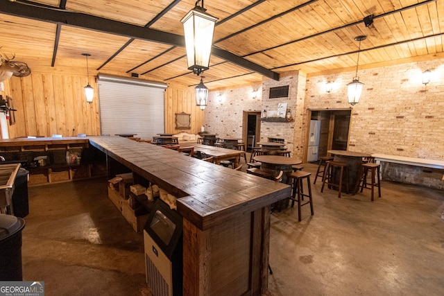1651 Mergendollar Rd, Good Hope, GA 30641 - bar with brick wall, finished concrete flooring, and wood ceiling