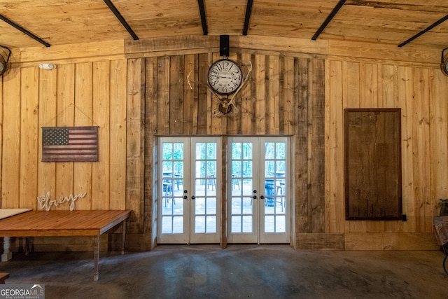 1651 Mergendollar Rd, Good Hope, GA 30641 - entryway with wood walls, french doors, unfinished concrete flooring, and wooden ceiling