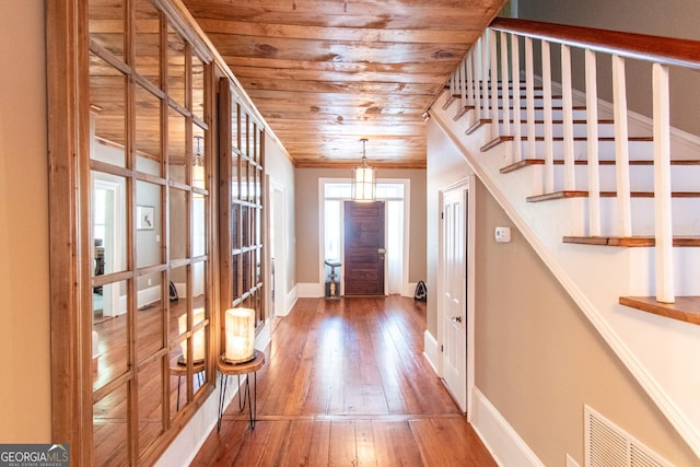 1651 Mergendollar Rd, Good Hope, GA 30641 - entryway featuring hardwood / wood-style floors, visible vents, baseboards, and wooden ceiling
