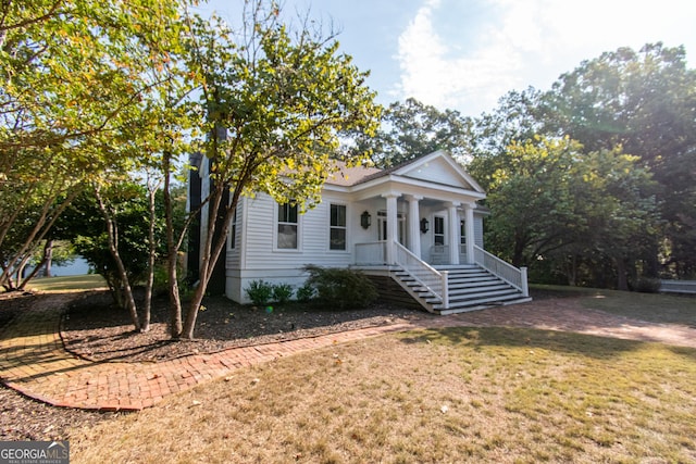 1651 Mergendollar Rd, Good Hope, GA 30641 - view of front of house featuring a front yard and a porch