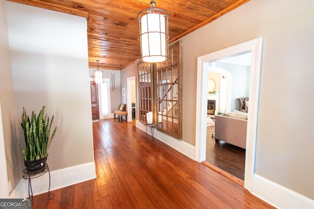 1651 Mergendollar Rd, Good Hope, GA 30641 - corridor with wooden ceiling, wood-type flooring, and baseboards