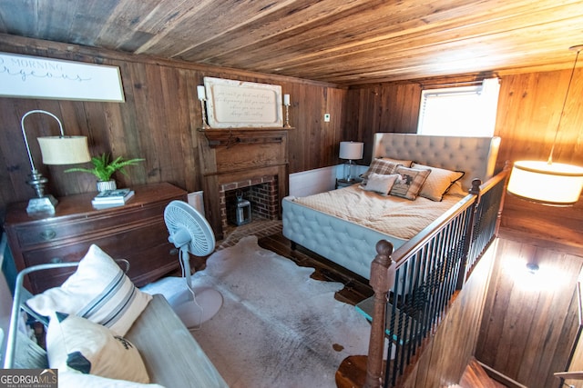 1651 Mergendollar Rd, Good Hope, GA 30641 - bedroom featuring wood walls, a fireplace, and wood ceiling