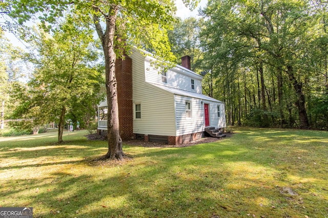 1651 Mergendollar Rd, Good Hope, GA 30641 - exterior space featuring entry steps, a lawn, and a chimney