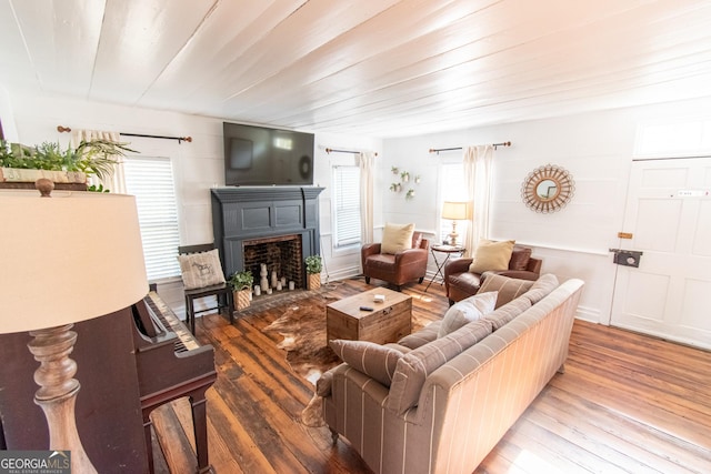 1651 Mergendollar Rd, Good Hope, GA 30641 - living room with a fireplace with flush hearth and wood finished floors