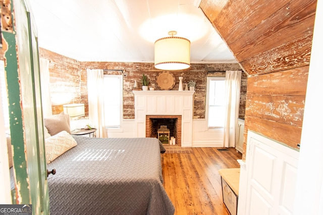 1651 Mergendollar Rd, Good Hope, GA 30641 - bedroom featuring light wood-type flooring, a fireplace, and wood ceiling