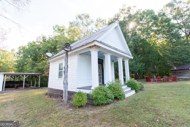1651 Mergendollar Rd, Good Hope, GA 30641 - view of home's exterior featuring a yard and an outbuilding