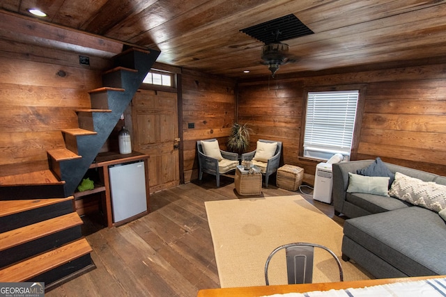 1651 Mergendollar Rd, Good Hope, GA 30641 - interior space featuring a ceiling fan, wooden ceiling, wood walls, stairs, and wood-type flooring