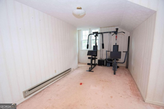 workout area featuring light carpet, lofted ceiling, and baseboard heating