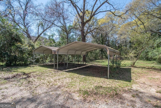 view of yard featuring a carport