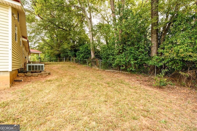 view of yard with central AC