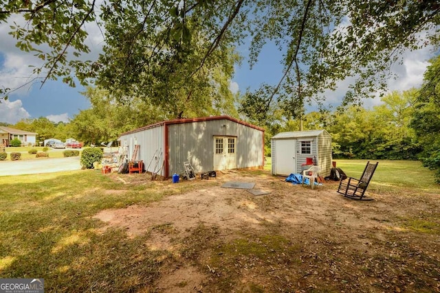 exterior space featuring a shed and a yard