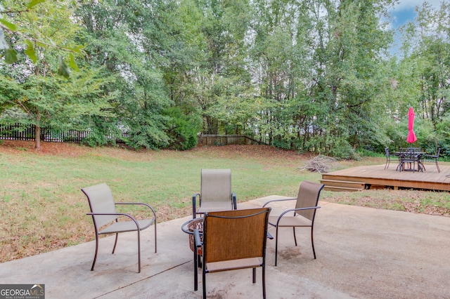 view of patio / terrace featuring a wooden deck