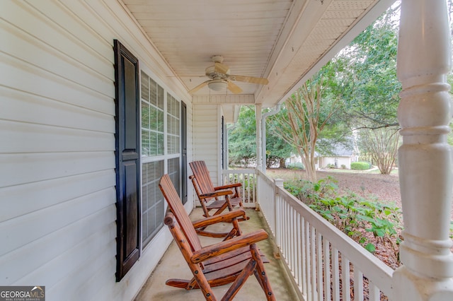 balcony featuring ceiling fan and a porch