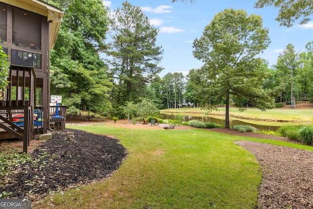 view of yard with a water view