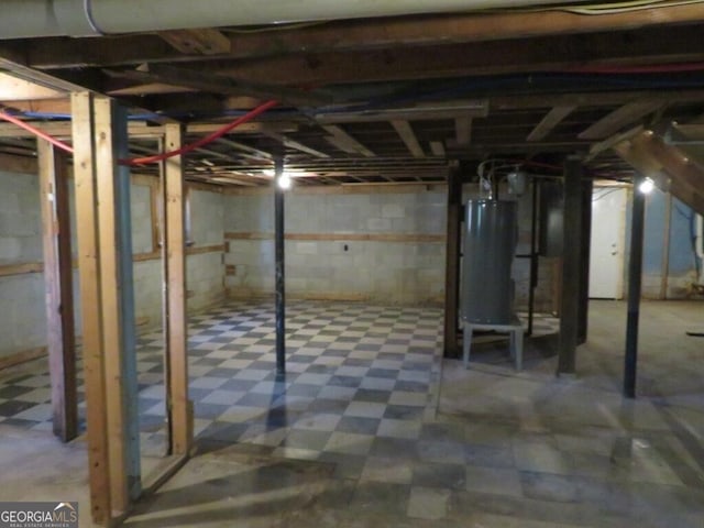 basement featuring gas water heater