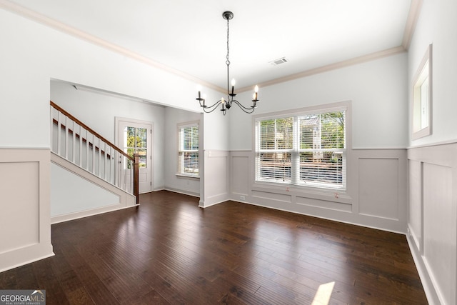 236 Westpark, Athens, GA 30606 - unfurnished dining area featuring a chandelier, wainscoting, stairs, ornamental molding, and dark wood-style flooring
