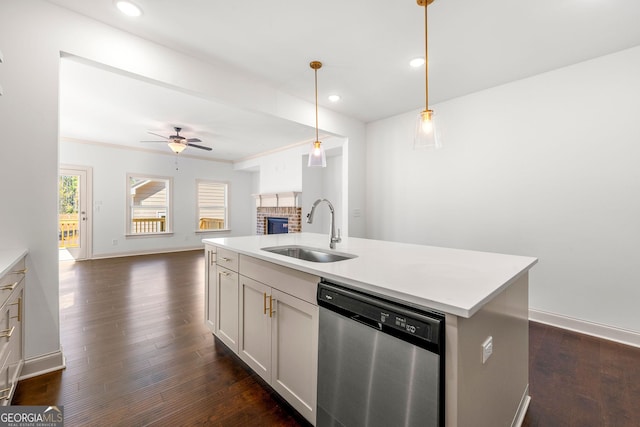 236 Westpark, Athens, GA 30606 - kitchen featuring stainless steel dishwasher, a sink, a brick fireplace, open floor plan, and ceiling fan