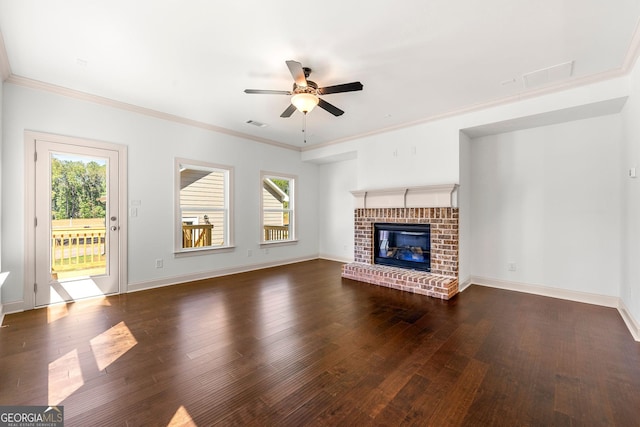 236 Westpark, Athens, GA 30606 - unfurnished living room with ceiling fan, healthy amount of natural light, wood-type flooring, crown molding, and a brick fireplace