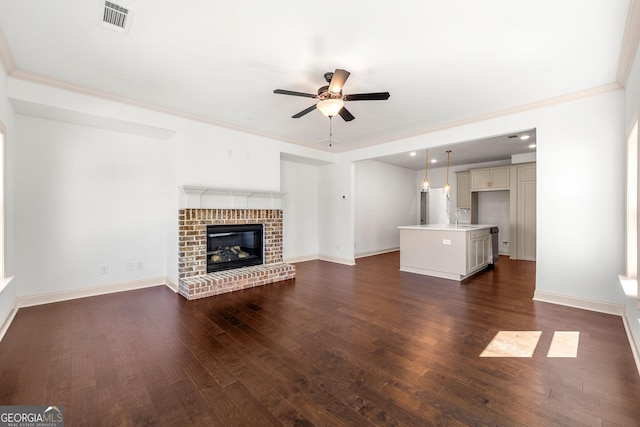 236 Westpark, Athens, GA 30606 - unfurnished living room featuring ceiling fan, a sink, dark wood finished floors, ornamental molding, and baseboards