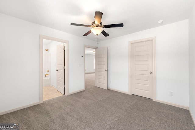 236 Westpark, Athens, GA 30606 - unfurnished bedroom featuring carpet, baseboards, ensuite bathroom, and a ceiling fan