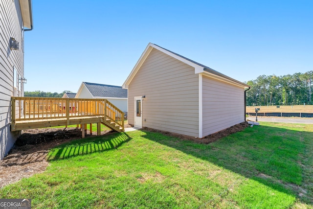 view of yard with a deck