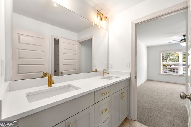 bathroom featuring vanity and ceiling fan