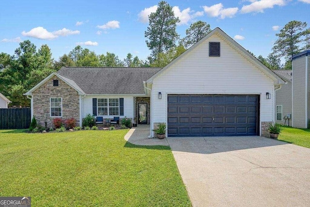 single story home featuring a front yard and a garage