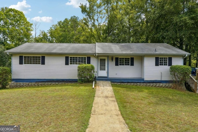 single story home with a front yard