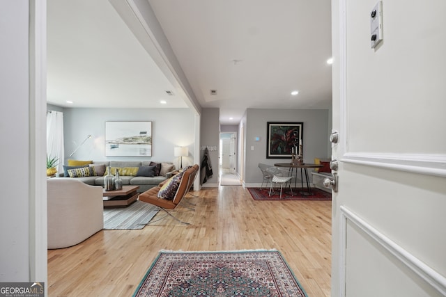 living room with light hardwood / wood-style flooring