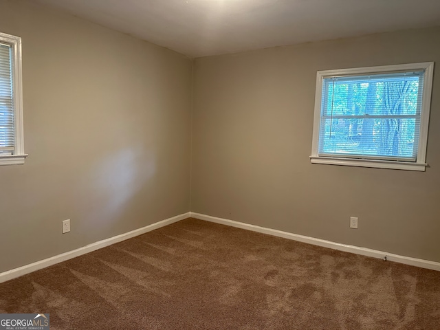 view of carpeted spare room