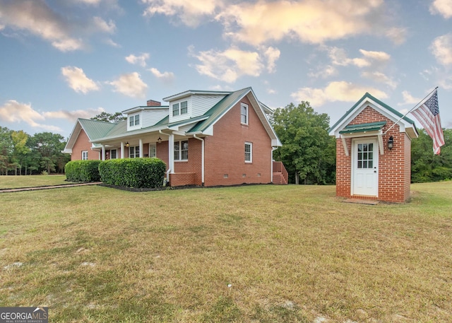 exterior space featuring a front lawn