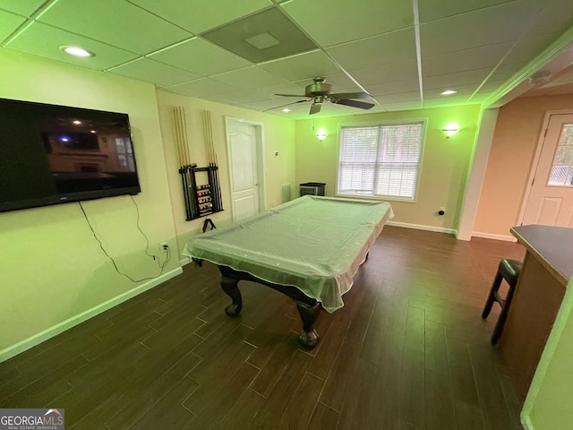 playroom with pool table, ceiling fan, a paneled ceiling, and dark hardwood / wood-style flooring