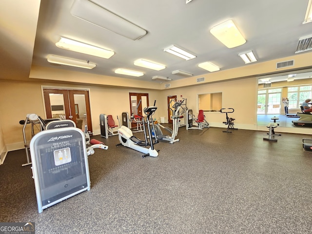 gym with french doors