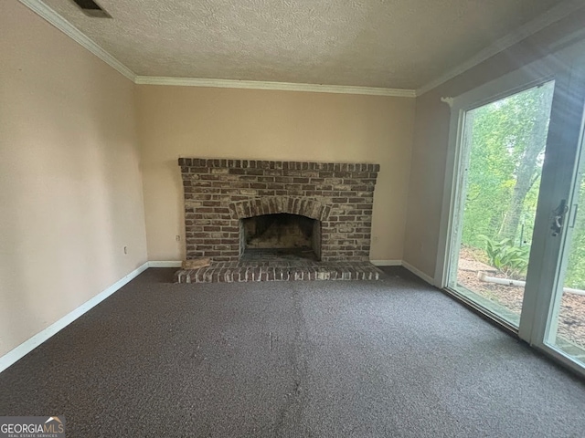 unfurnished living room with carpet floors, a healthy amount of sunlight, and a fireplace