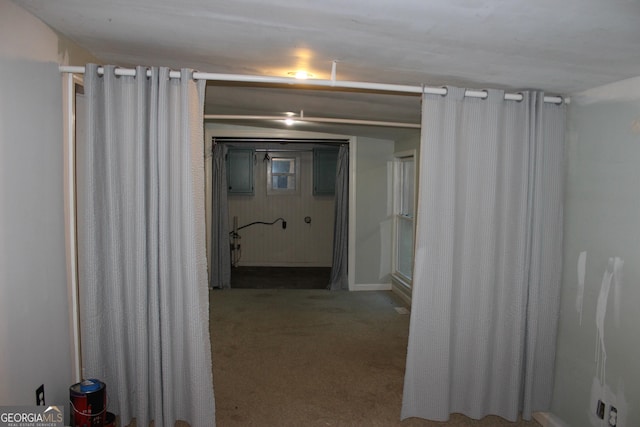 corridor featuring carpet