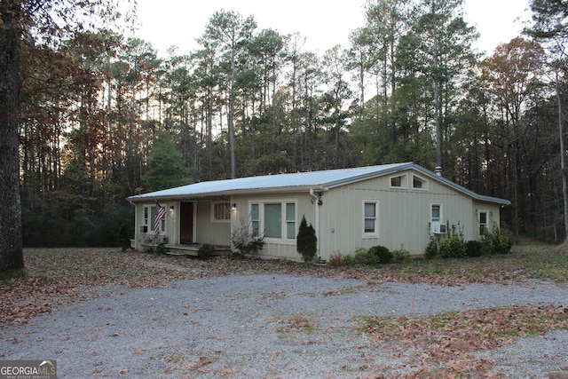 single story home with cooling unit