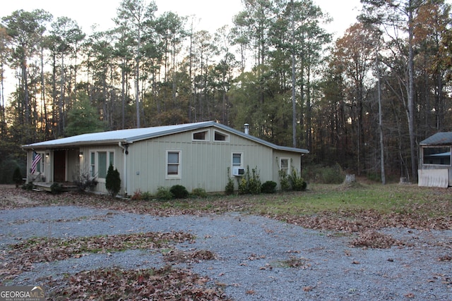 view of home's exterior with cooling unit