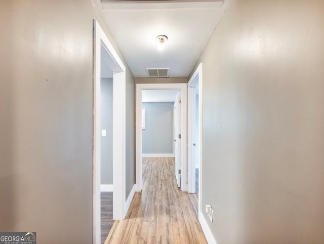 hall featuring light hardwood / wood-style flooring