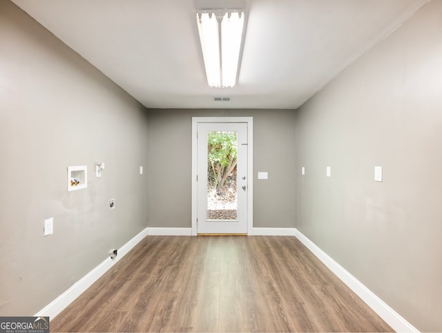 doorway to outside with hardwood / wood-style floors