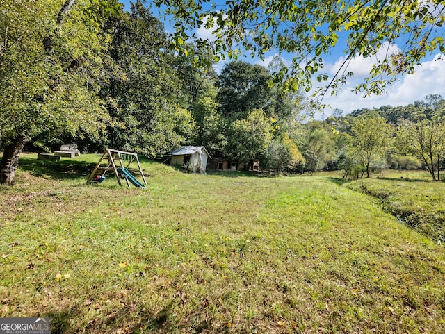 view of yard with a playground