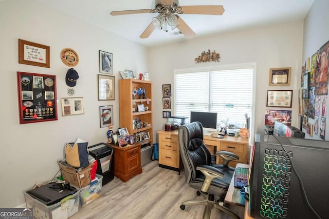 office space with ceiling fan and light hardwood / wood-style floors