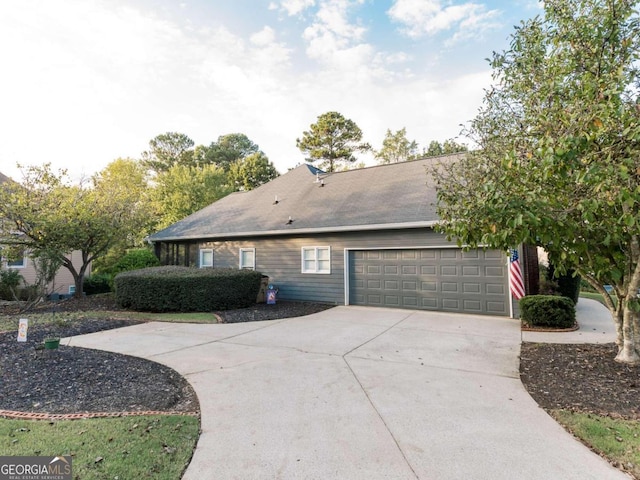 view of property exterior featuring a garage