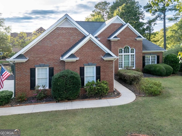 view of front of property with a front lawn