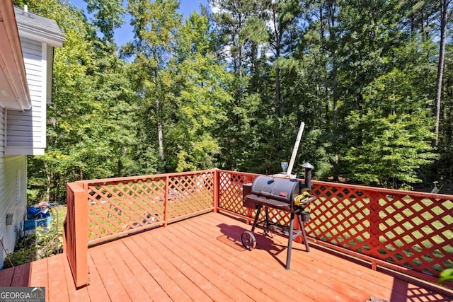 deck featuring a grill