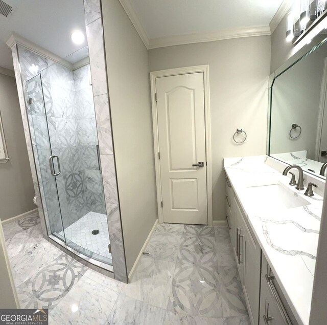 bathroom featuring vanity, toilet, ornamental molding, and a shower with door