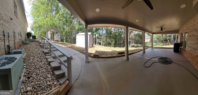 view of patio / terrace with ceiling fan and cooling unit